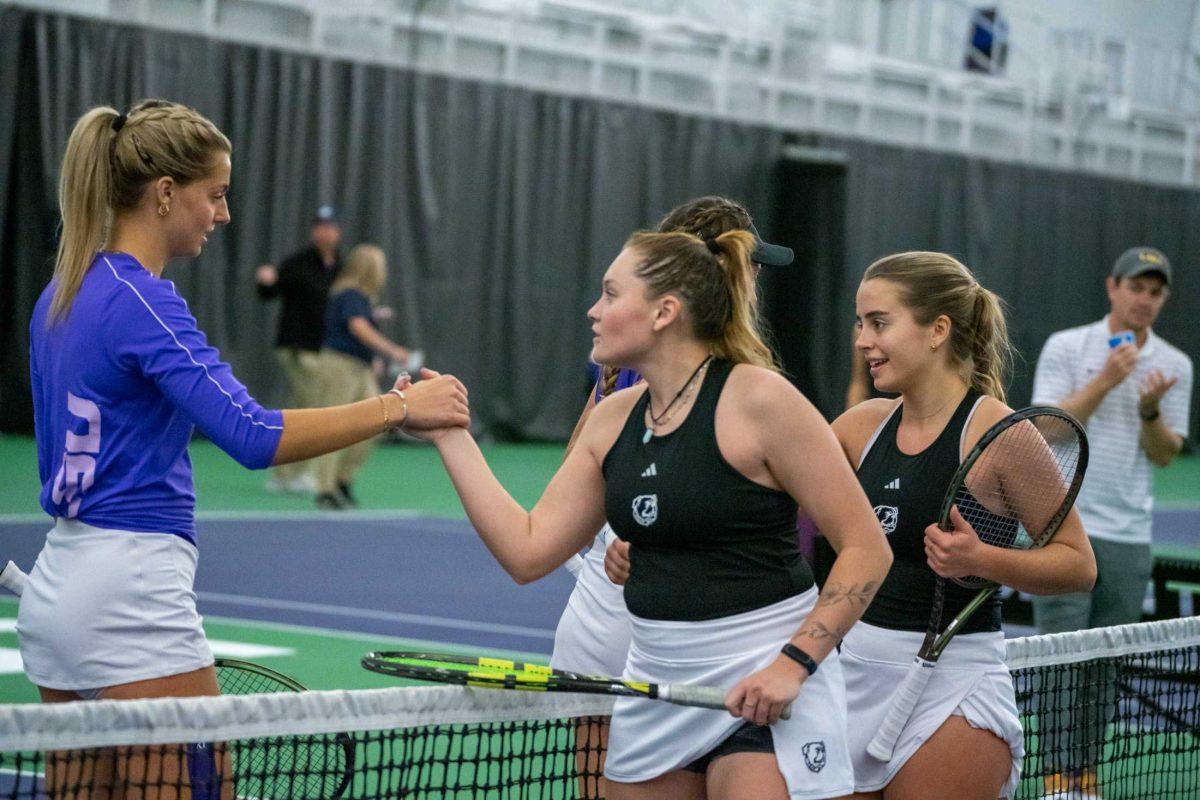 LSU women's tennis junior Florentine Dekkers and graduate student Aran Teixido Garcia shake hands with their opponents during their 6-2 doubles win against LA Tech Saturday, Jan. 20, 2024, at the LSU Tennis Complex on Gourrier Avenue in Baton Rouge, La.