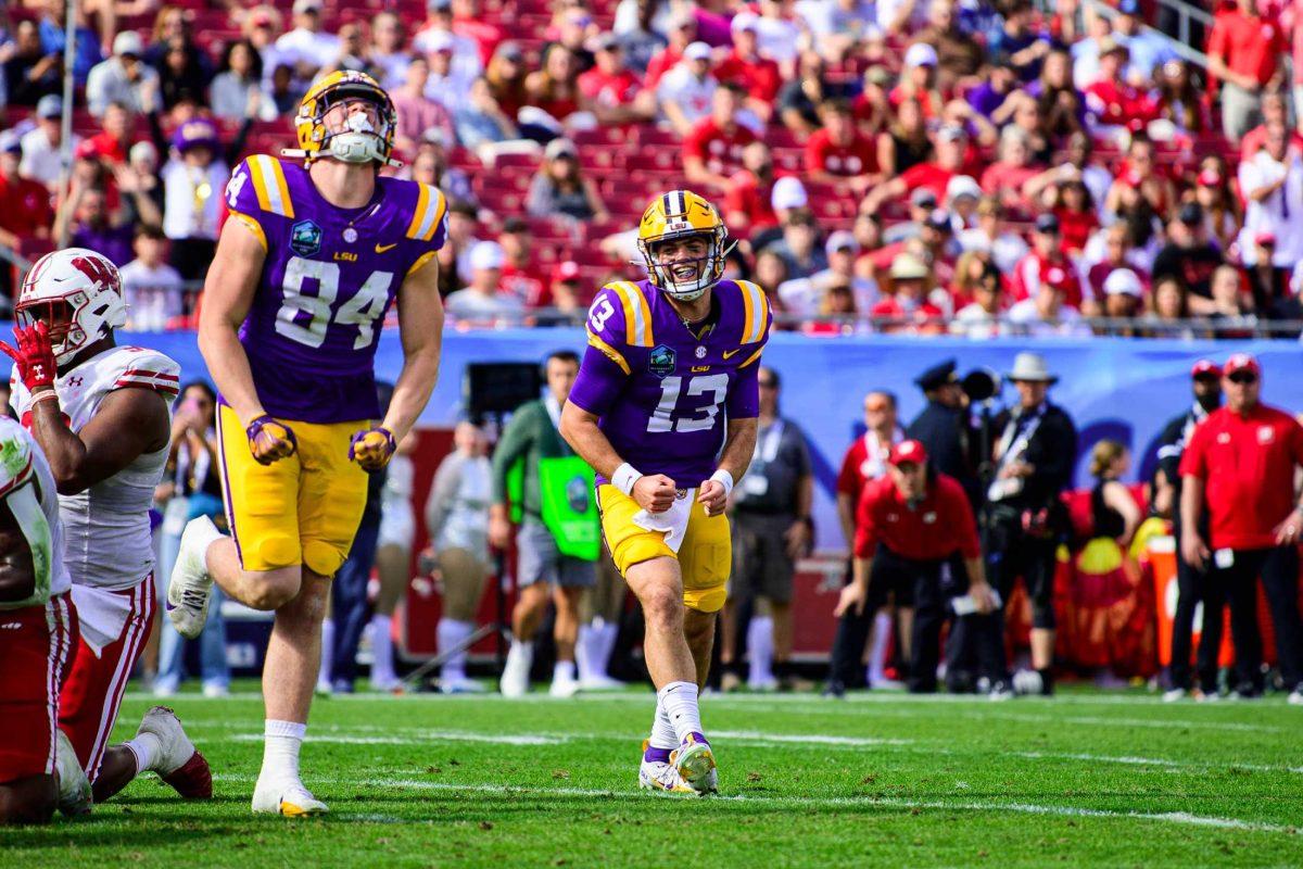 LSU football redshirt sophomore quarterback Garrett Nussmeier (13) celebrates a touchdown on Monday, Jan. 1, 2024, during LSU's 35-31 victory against Wisconsin in Raymond James Stadium in Tampa, Fl.