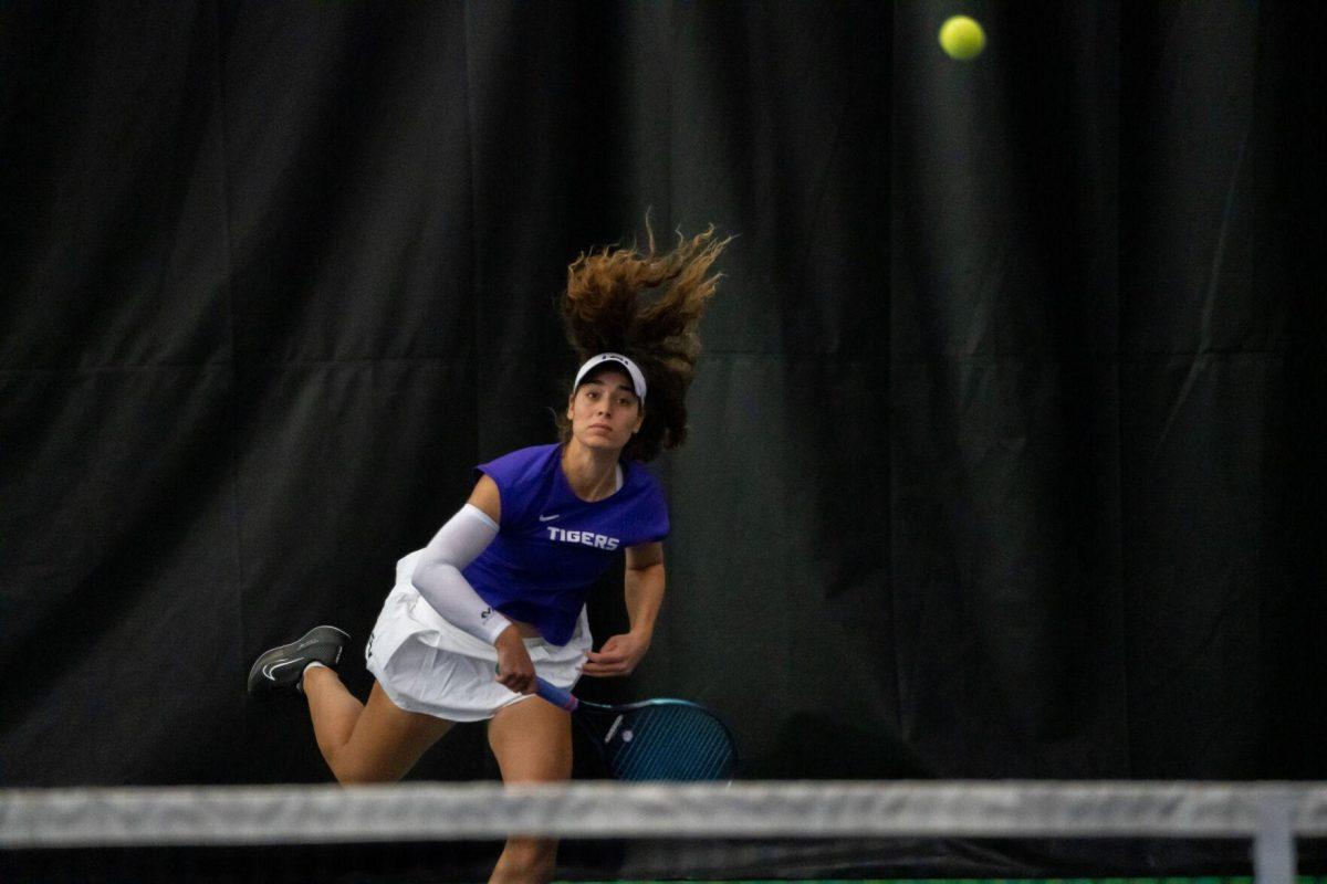 LSU women's tennis graduate student Maya Tahan hits a serve during her 4-3 doubles win against LA Tech Saturday, Jan. 20, 2024, at the LSU Tennis Complex on Gourrier Avenue in Baton Rouge, La.