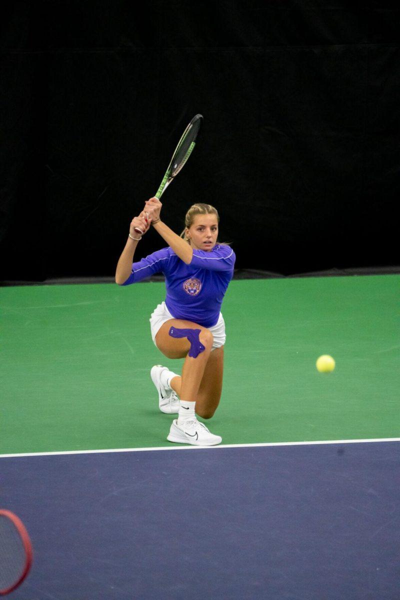 LSU women's tennis junior Florentine Dekkers hits a backhand during her 6-2 doubles win against LA Tech Saturday, Jan. 20, 2024, at the LSU Tennis Complex on Gourrier Avenue in Baton Rouge, La.