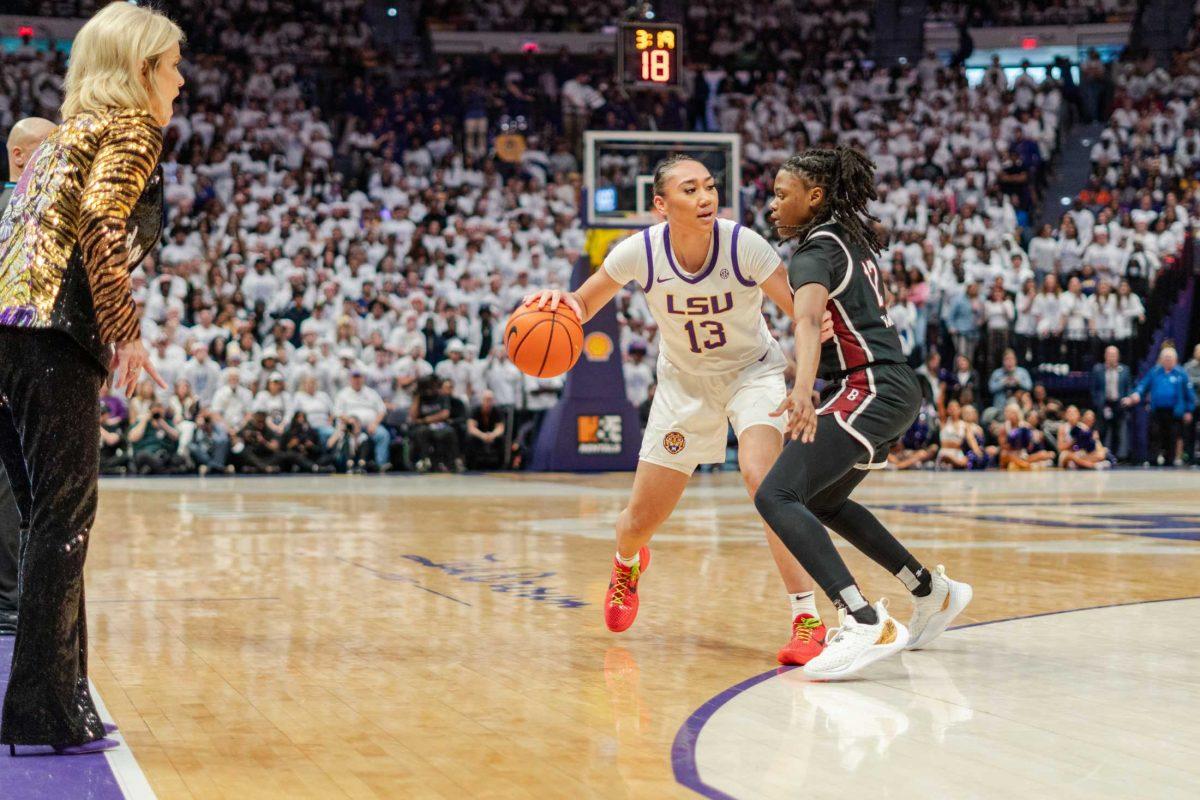 LSU women&#8217;s basketball junior guard Last-Tear Poa (13) dribbles the ball Thursday, Jan. 25, 2024, during LSU&#8217;s 76-70 loss against South Carolina in the Pete Maravich Assembly Center in Baton Rouge, La.