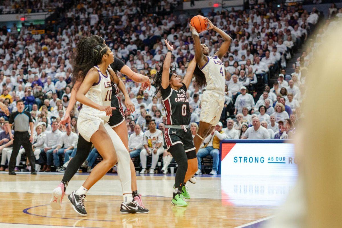 LSU women&#8217;s basketball sophomore guard Flau&#8217;jae Johnson (4) puts the ball up Thursday, Jan. 25, 2024, during LSU&#8217;s 76-70 loss against South Carolina in the Pete Maravich Assembly Center in Baton Rouge, La.