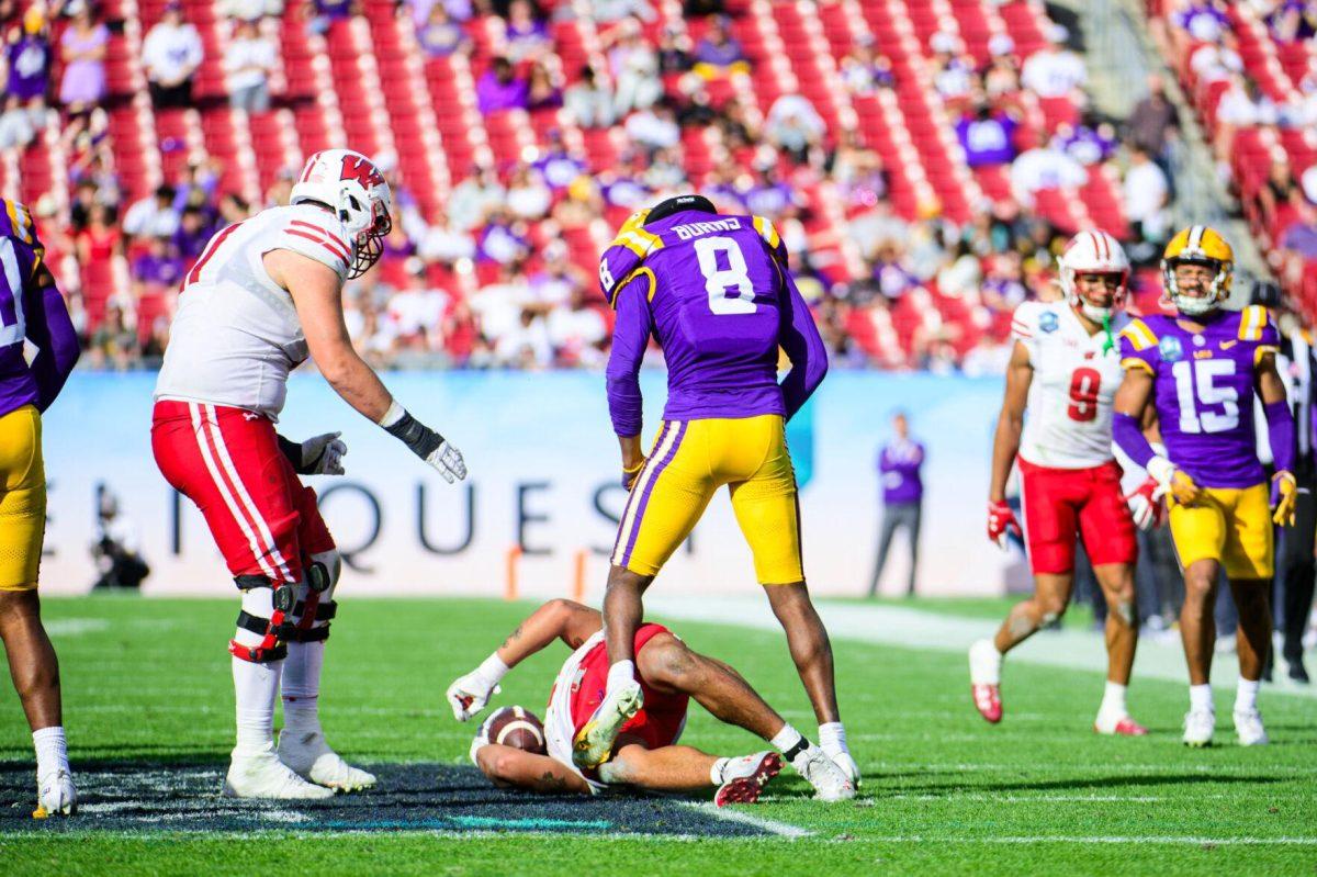 LSU football junior safety Major Burns (8) looks down at his opponent on Monday, Jan. 1, 2024, during LSU's 35-31 victory against Wisconsin in Raymond James Stadium in Tampa, Fl.