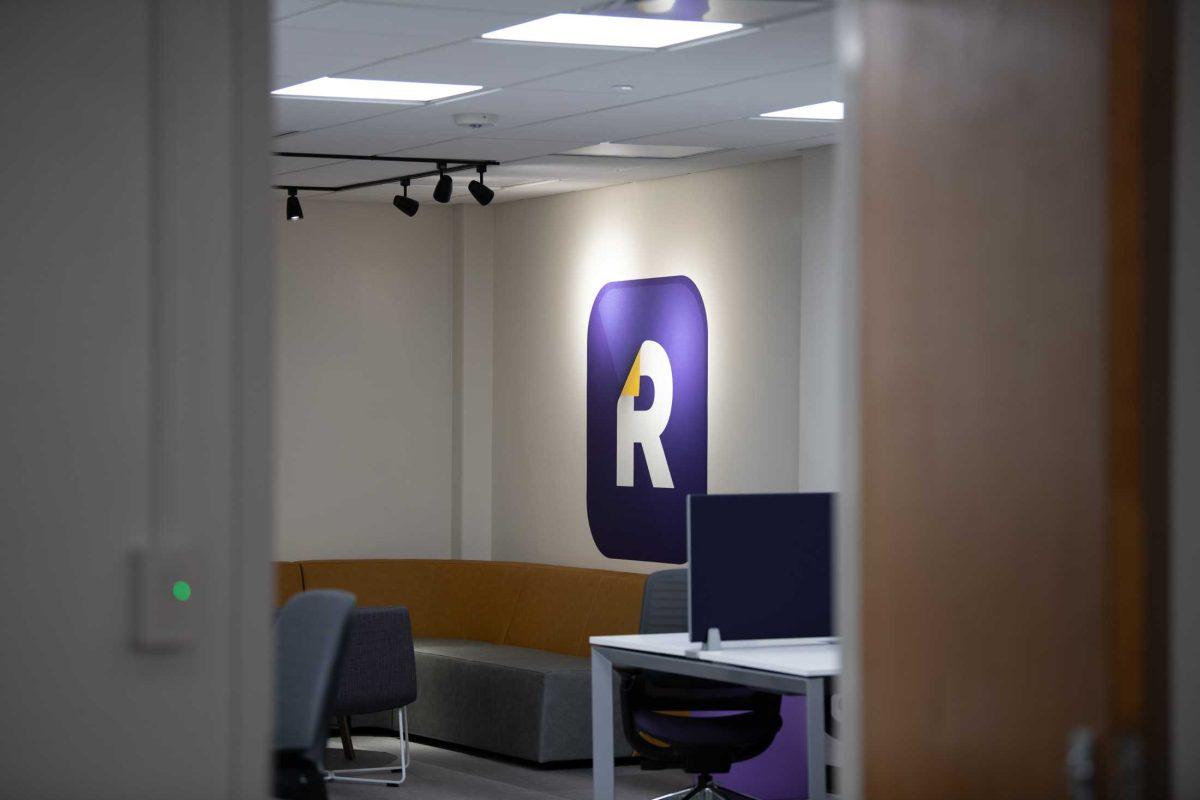 The Reveille newsroom peeks through a doorway Thursday, July 27, 2023, inside Hodges Hall in Baton Rouge, La.