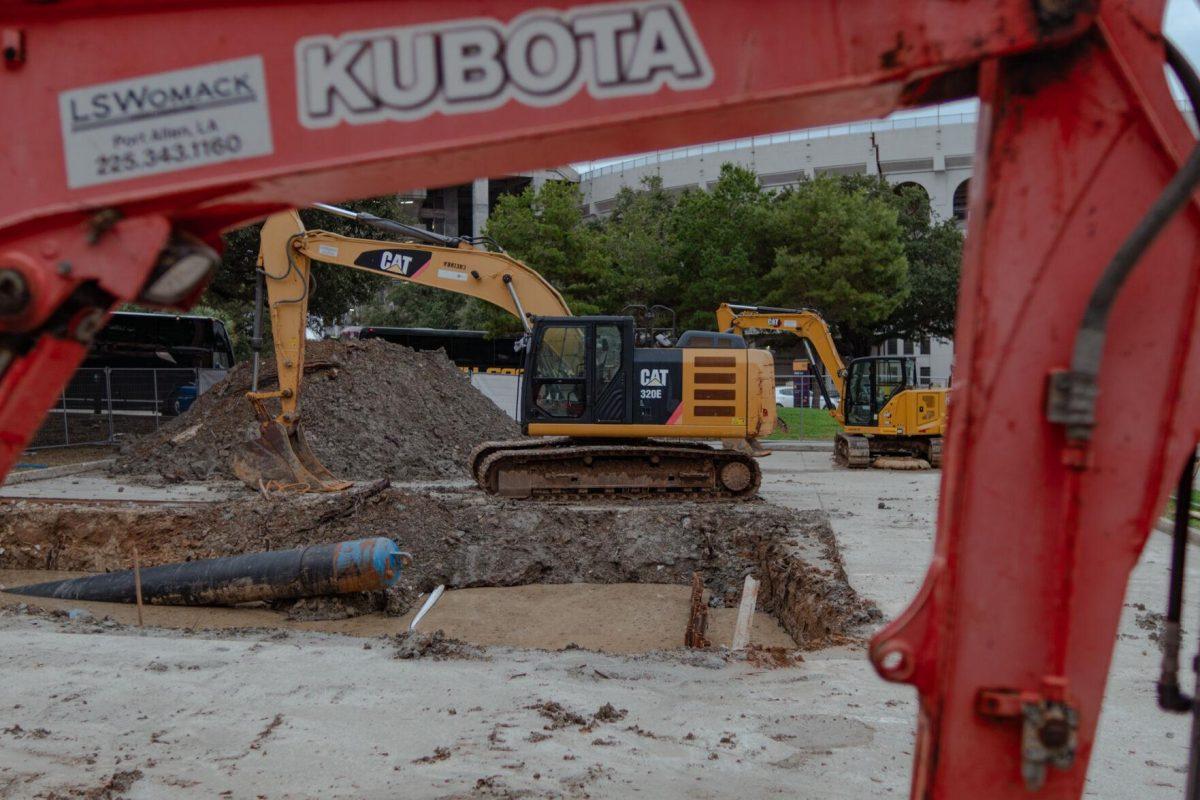 Excavators sit in a fenced-off area Saturday, Jan. 27, 2024, on LSU's campus in Baton Rouge, La.