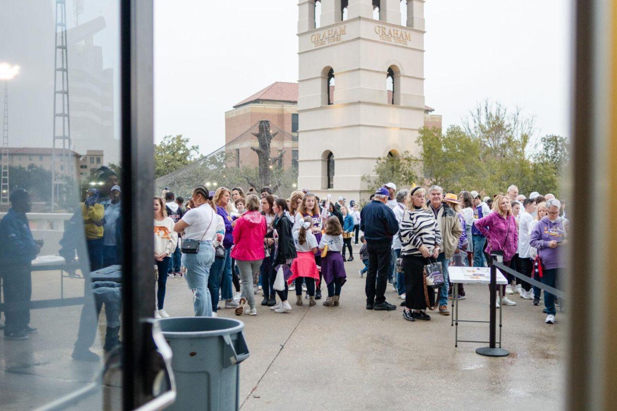 Fans wait in line Thursday, Jan. 25, 2024, prior to LSU&#8217;s 76-70 loss against South Carolina in the Pete Maravich Assembly Center in Baton Rouge, La.