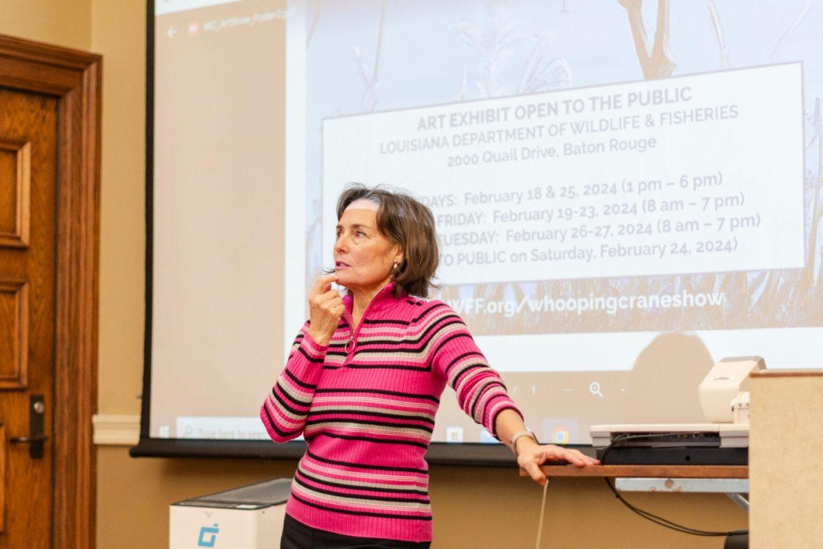 Margo Brault discusses whooping crane conservation and an art contest revolving around the birds Tuesday, Jan. 30, 2024, inside the LSU Journalism Building in Baton Rouge, La.