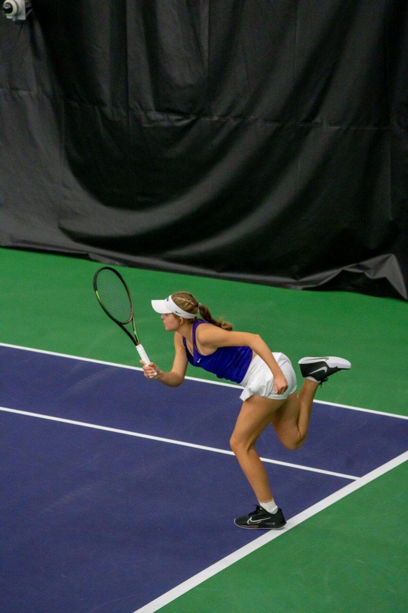 LSU women's tennis freshman Kenna Erickson hits a serve during her 4-3 doubles win against LA Tech Saturday, Jan. 20, 2024, at the LSU Tennis Complex on Gourrier Avenue in Baton Rouge, La.