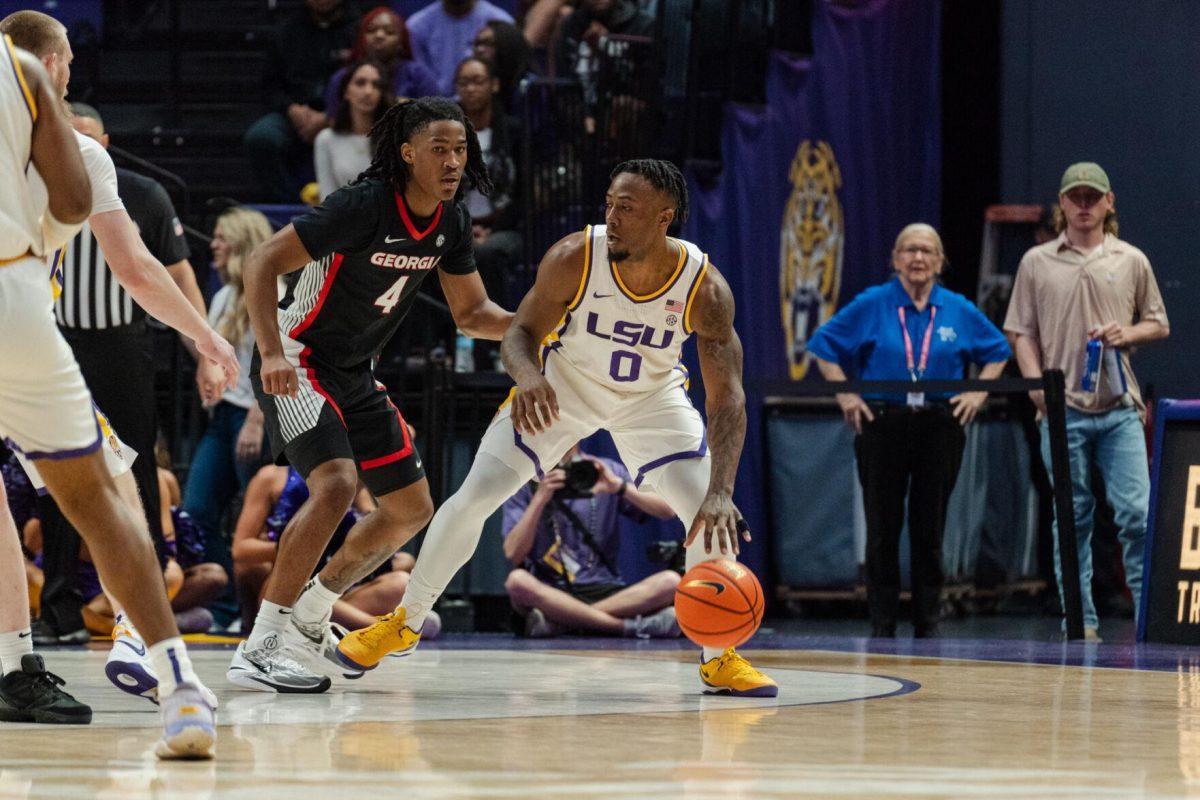 LSU men&#8217;s basketball 5th-year senior guard Trae Hannibal (0) dribbles the ball Tuesday, Feb. 27, 2024, during LSU&#8217;s 67-66 win against Georgia in the Pete Maravich Assembly Center in Baton Rouge, La.