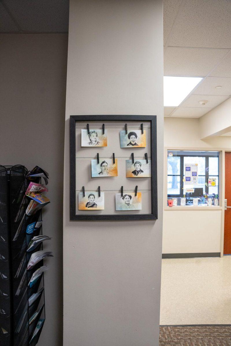 A sign depicting famous Women's Rights activists hangs Sunday, Feb. 4, 2024 at the LSU Women's Center on Veterans Drive in Baton Rouge. La.