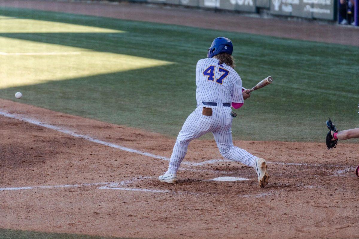 LSU baseball junior third baseman Tommy White (47) swings his bat Friday, Feb. 23, 2024, during LSU&#8217;s 5-2 loss against Stony Brook at Alex Box Stadium in Baton Rouge, La.