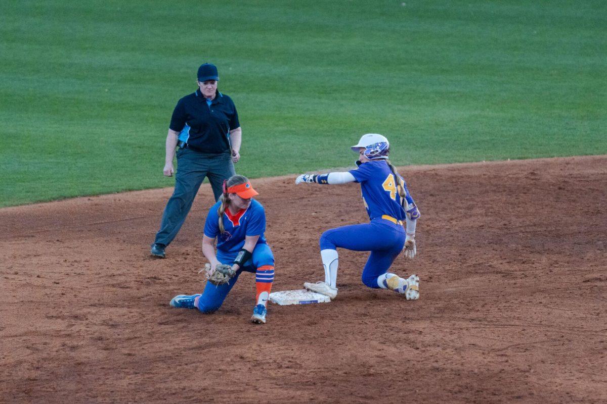 LSU softball senior outfielder/catcher Ali Newland (44) slides into second base Friday, Feb. 23, 2024, during LSU&#8217;s 8-5 win over Boise State at Tiger Park in Baton Rouge, La.