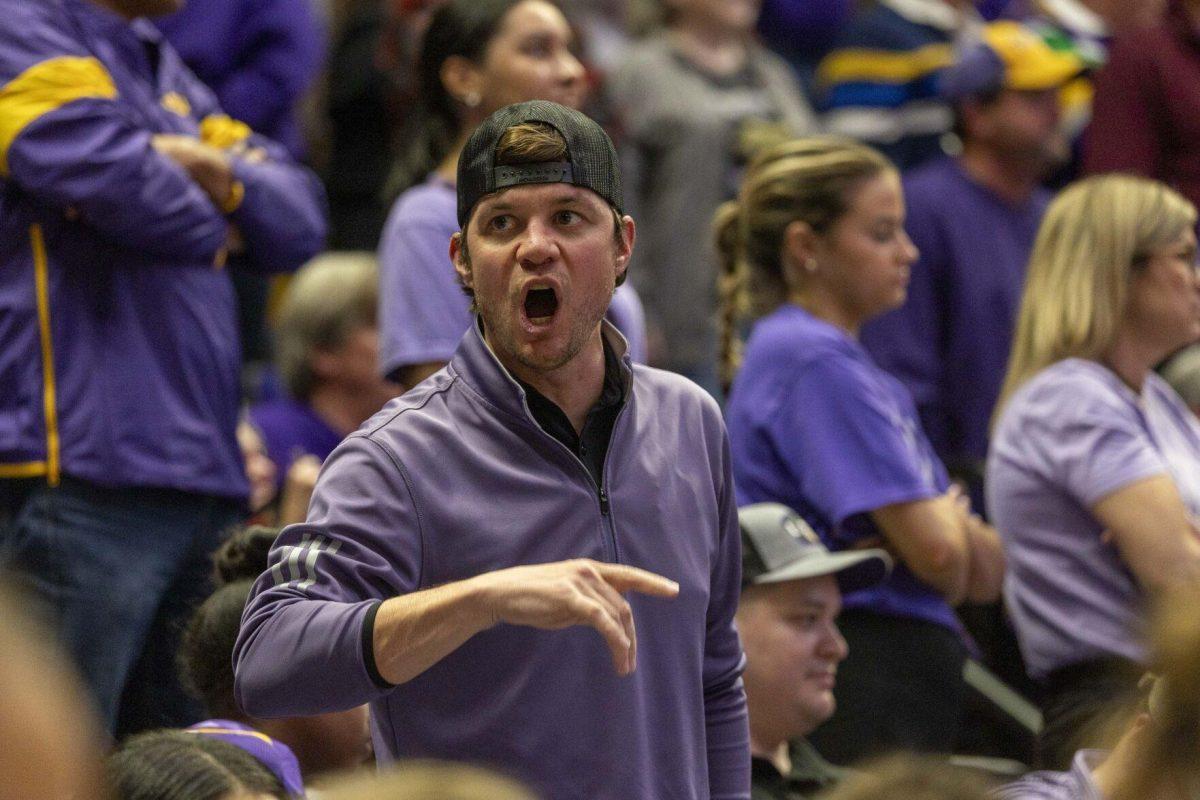 A LSU women's basketball fan protests a referee decision Thursday, Feb. 22, 2024, during LSU's 71-66 win over Auburn Pete Maravich Assembly Center in Baton Rouge, La.
