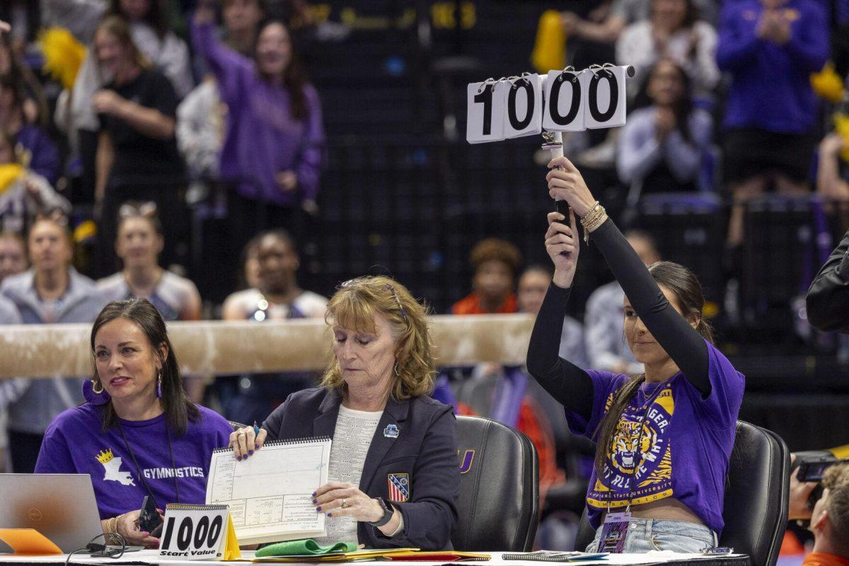 LSU gymnastics junior all-around Aleah Finnegan receives a 10 Friday, Feb. 16, 2024, during LSU's win 198.300-197.10 against Auburn in the Pete Maravich Assembly Center.