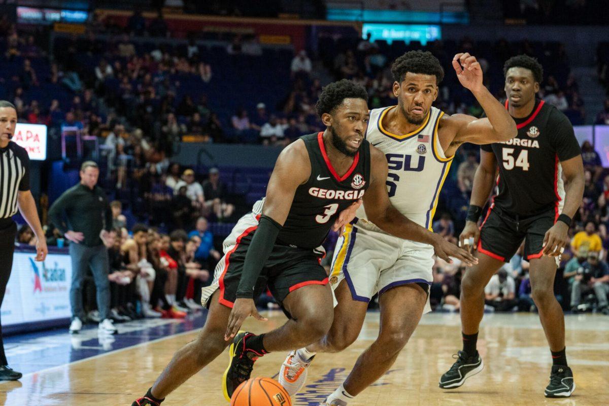 LSU men&#8217;s basketball graduate student guard Jordan Wright (6) defends against a Georgia player Tuesday, Feb. 27, 2024, during LSU&#8217;s 67-66 win against Georgia in the Pete Maravich Assembly Center in Baton Rouge, La.