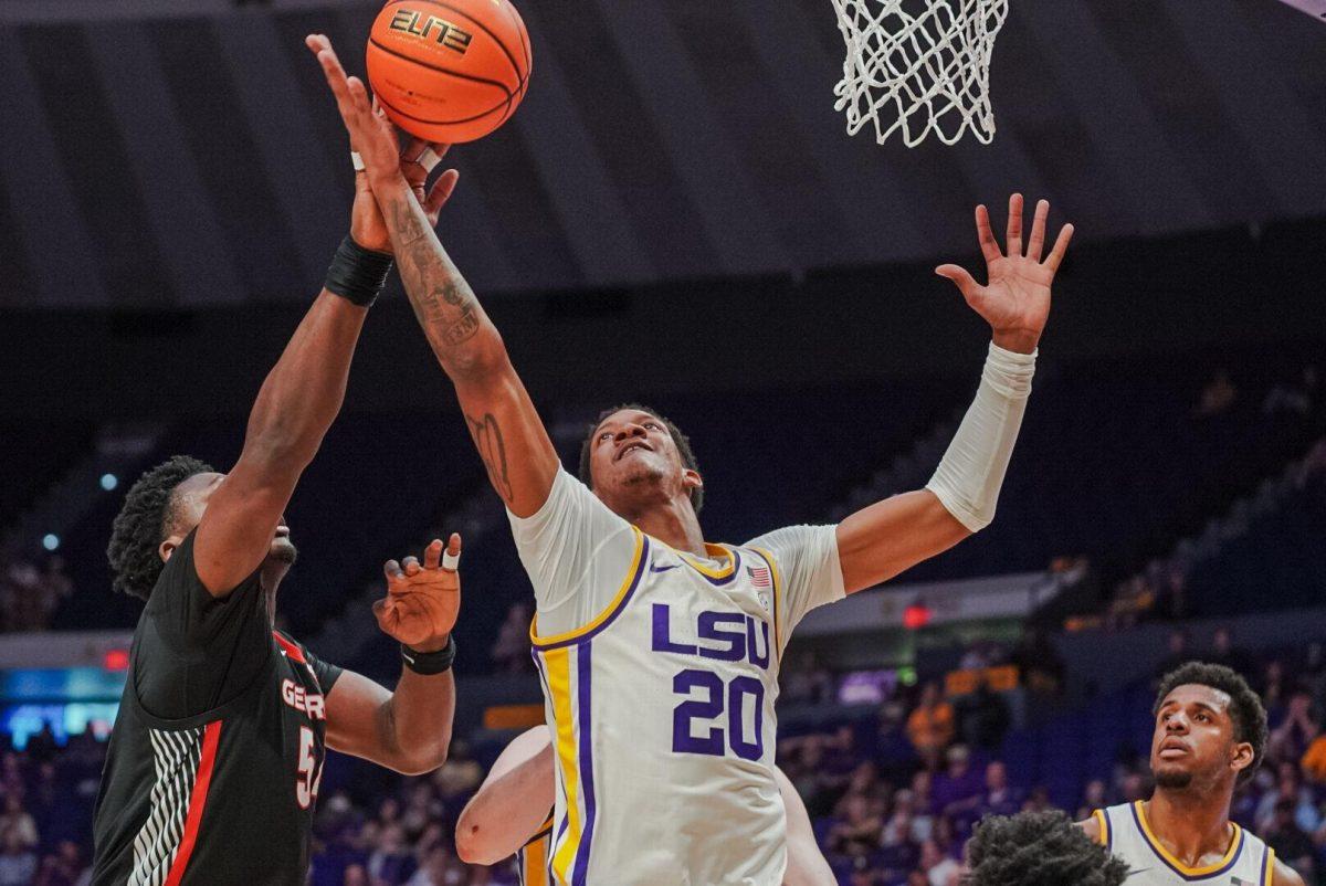 LSU men&#8217;s basketball senior forward Derek Fountain (20) goes for the rebound Tuesday, Feb. 27, 2024, during LSU&#8217;s game against Georgia in the Pete Maravich Assembly Center in Baton Rouge, La.