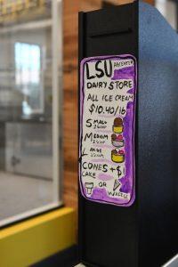 A small sign shows the menu at the new Dairy Store location Tuesday, Feb. 20, 2024, on S. Campus Dr. on LSU’s campus in Baton Rouge, La.