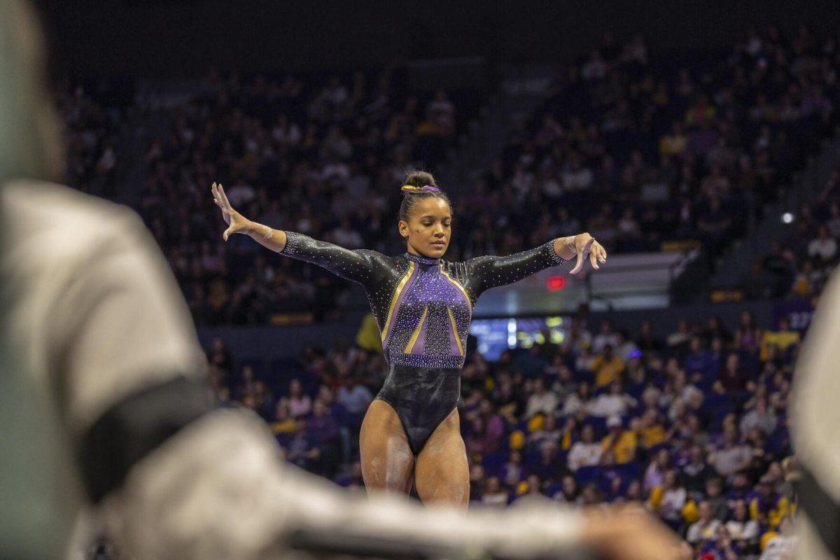 LSU gymnastics senior all-around Haleigh Bryant anticipates her next move Friday, Feb. 16, 2024, during LSU's win 198.300-197.10 against Auburn in the Pete Maravich Assembly Center.