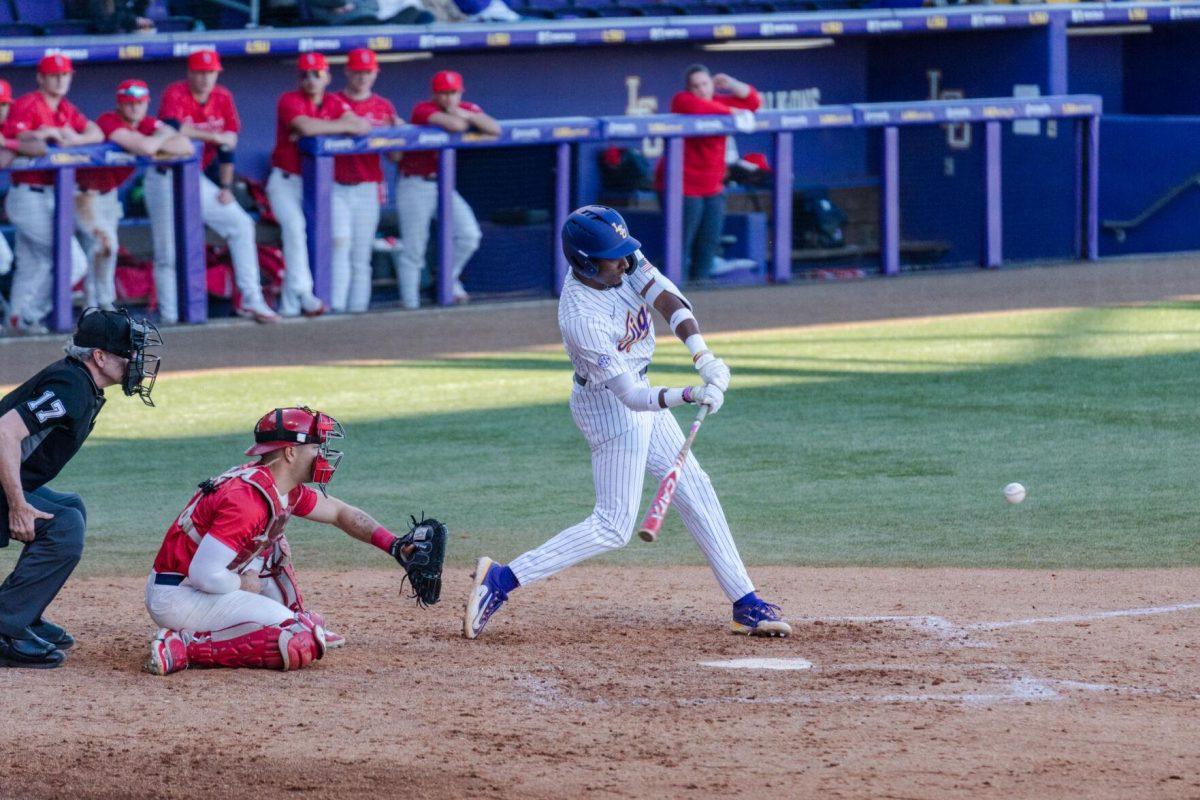 LSU baseball junior infielder Michael Braswell III (10) swings for the ball Friday, Feb. 23, 2024, during LSU&#8217;s 5-2 loss against Stony Brook at Alex Box Stadium in Baton Rouge, La.