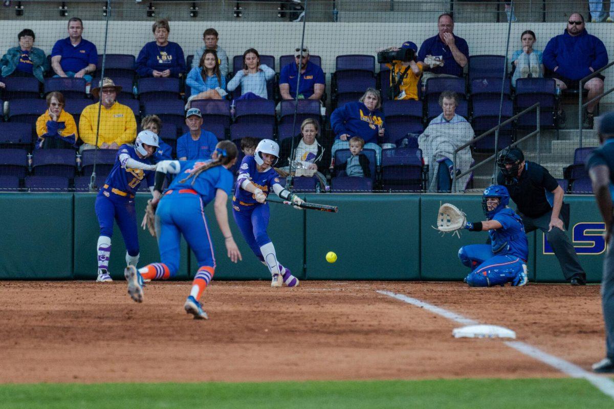 LSU softball graduate student outfielder Ciara Briggs (88) lays down a bunt Friday, Feb. 23, 2024, during LSU&#8217;s 8-5 win over Boise State at Tiger Park in Baton Rouge, La.