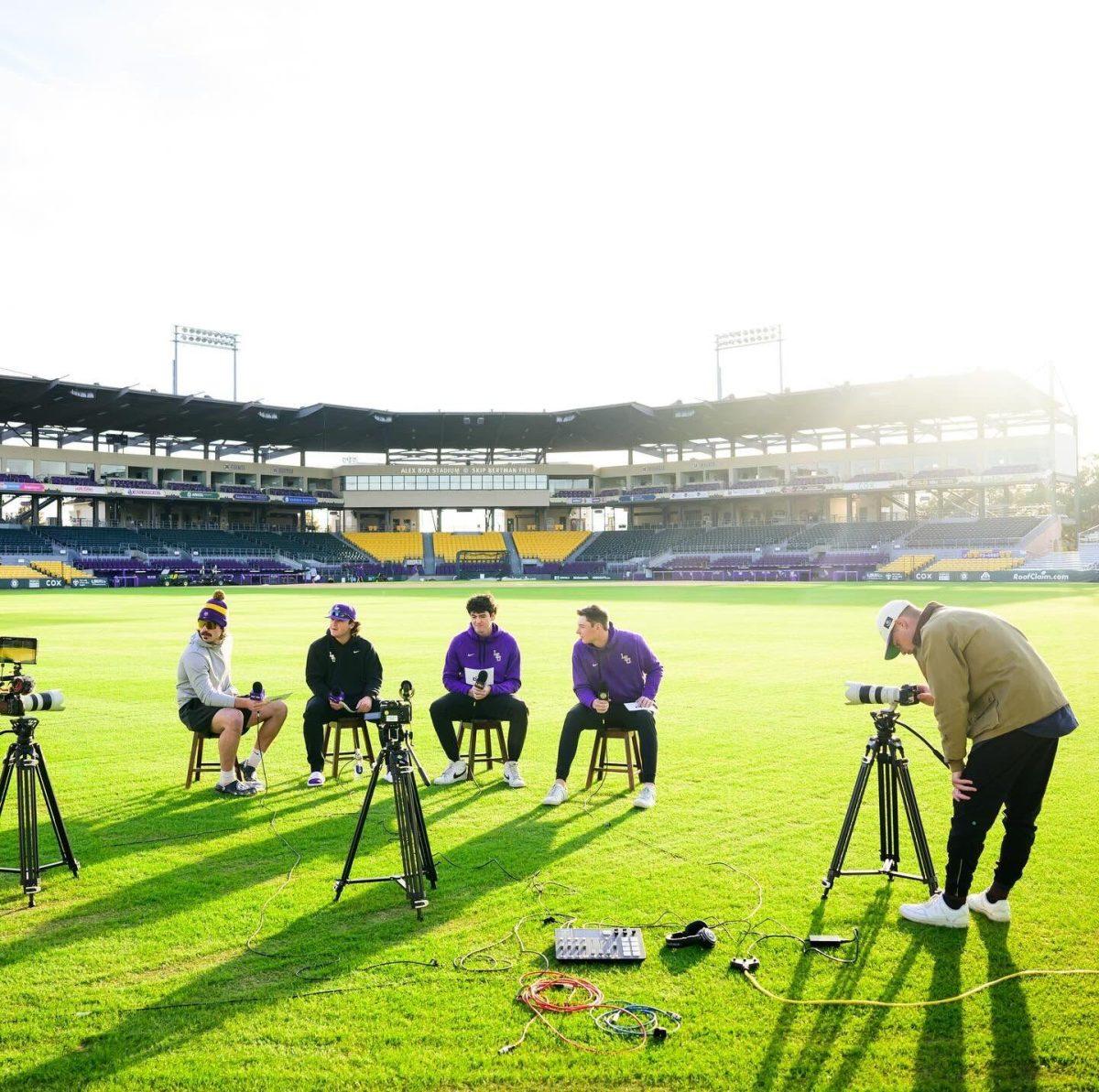 Dawson Ahrenstorff films players for LSU GOLD series on Skip Bertman Field at Alex Box Stadium.&#160;