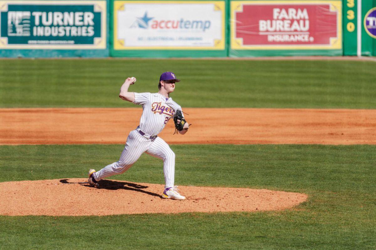 LSU baseball junior pitcher Thatcher Hurd (26) throws the ball Friday, Feb. 23, 2024, during LSU&#8217;s 5-2 loss against Stony Brook at Alex Box Stadium in Baton Rouge, La.