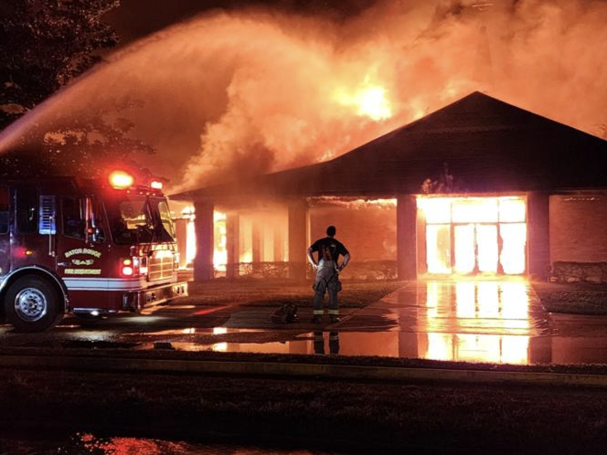 A firetruck sprays water on the blaze engulfing St. Luke's Episcopal Church, Feb. 17, in Baton Rouge, La.&#160;