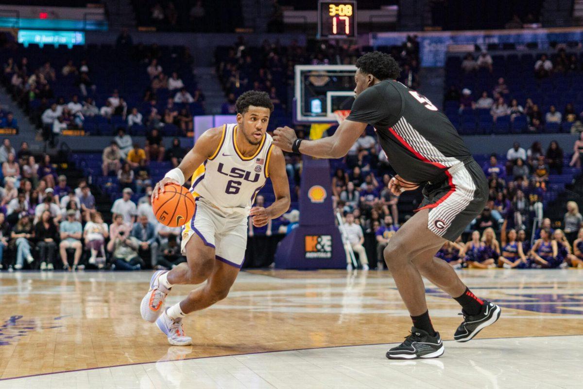 LSU men&#8217;s basketball graduate student guard Jordan Wright (6) drives in Tuesday, Feb. 27, 2024, during LSU&#8217;s 67-66 win against Georgia in the Pete Maravich Assembly Center in Baton Rouge, La.