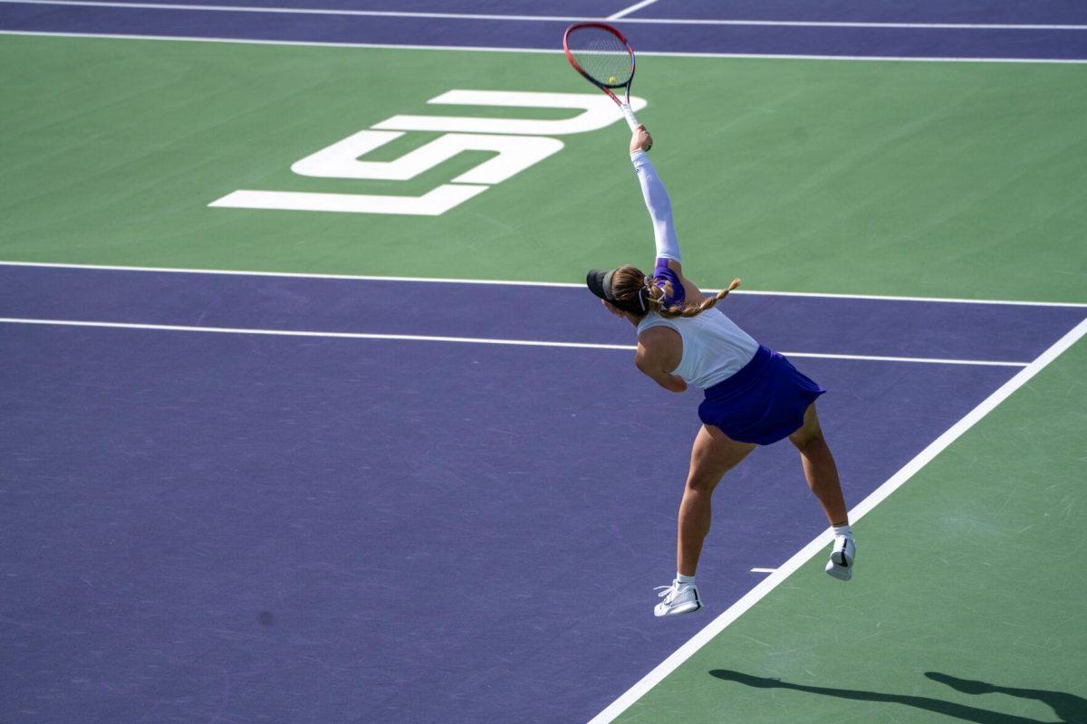 LSU women's tennis graduate student Aran Texido Garcia hits a serve during her 6-3, 6-1 singles win against Rice Sunday, Feb. 4, 2023 at the LSU Tennis Complex on Gourrier Avenue in Baton Rouge, La.