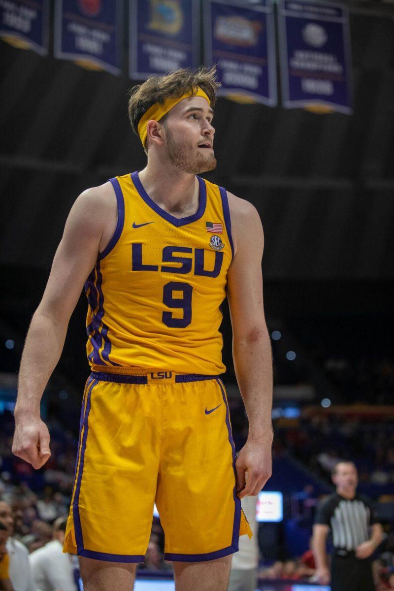 LSU men's basketball graduate student forward Will Baker (9) looks to make his next move on Saturday, Feb. 3, 2024, during LSU's 94-74 win against Arkansas in the Pete Maravich Assembly Center in Baton Rouge, La.