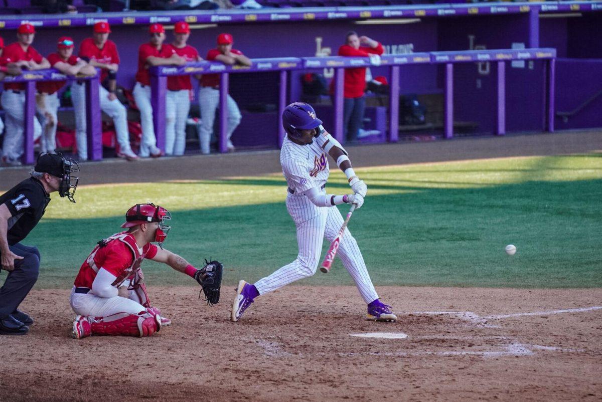 LSU baseball junior infielder Michael Braswell III (10) swings for the ball Friday, Feb. 23, 2024, during LSU&#8217;s game against Stony Brook at Alex Box Stadium in Baton Rouge, La.