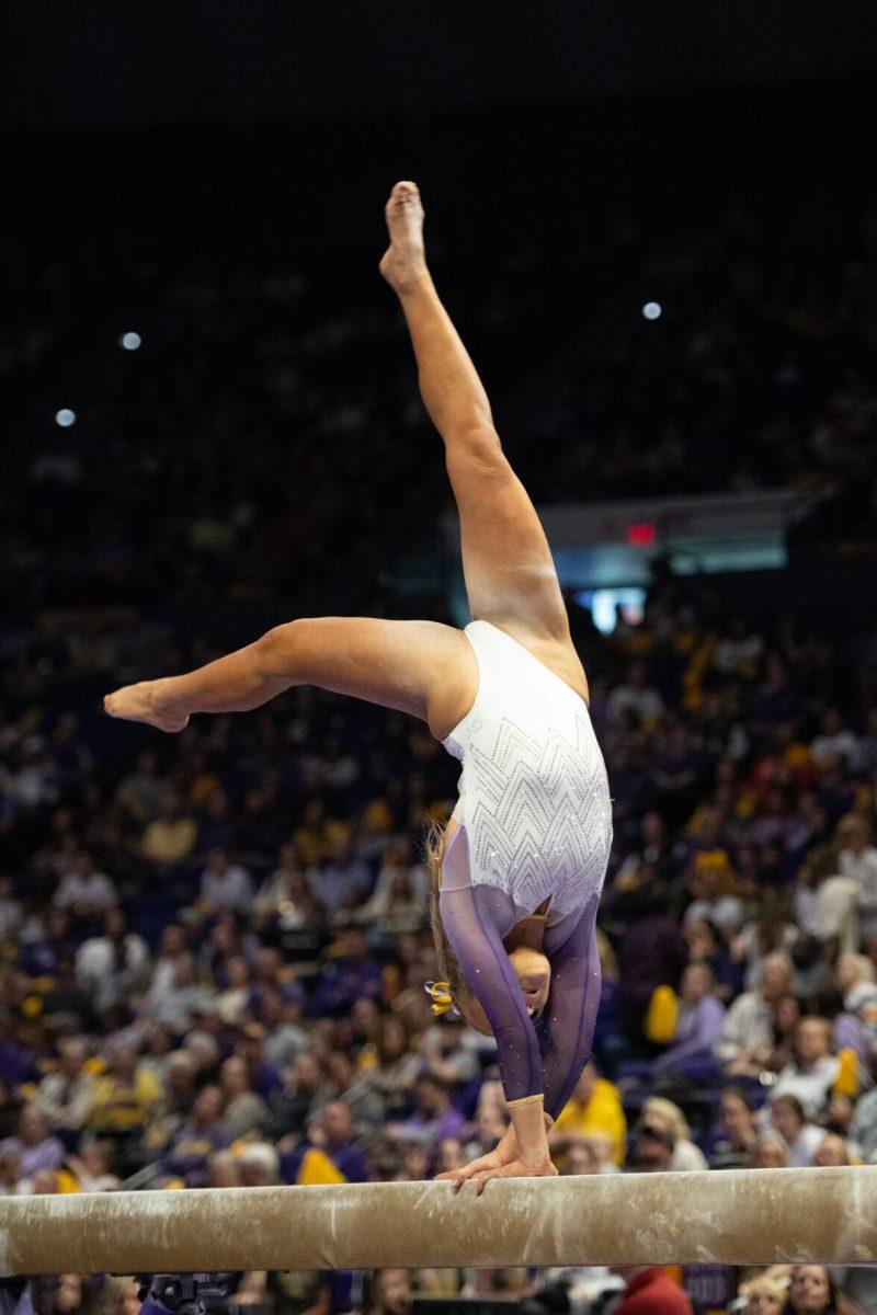 LSU gymnastics vault/balance beam/floor exercise graduate student Sierra Ballard performs on the balance beam Friday, Feb. 2, 2024, during LSU&#8217;s 198.475-196.200 win against Arkansas at the Pete Maravich Assembly Center in Baton Rouge, La.