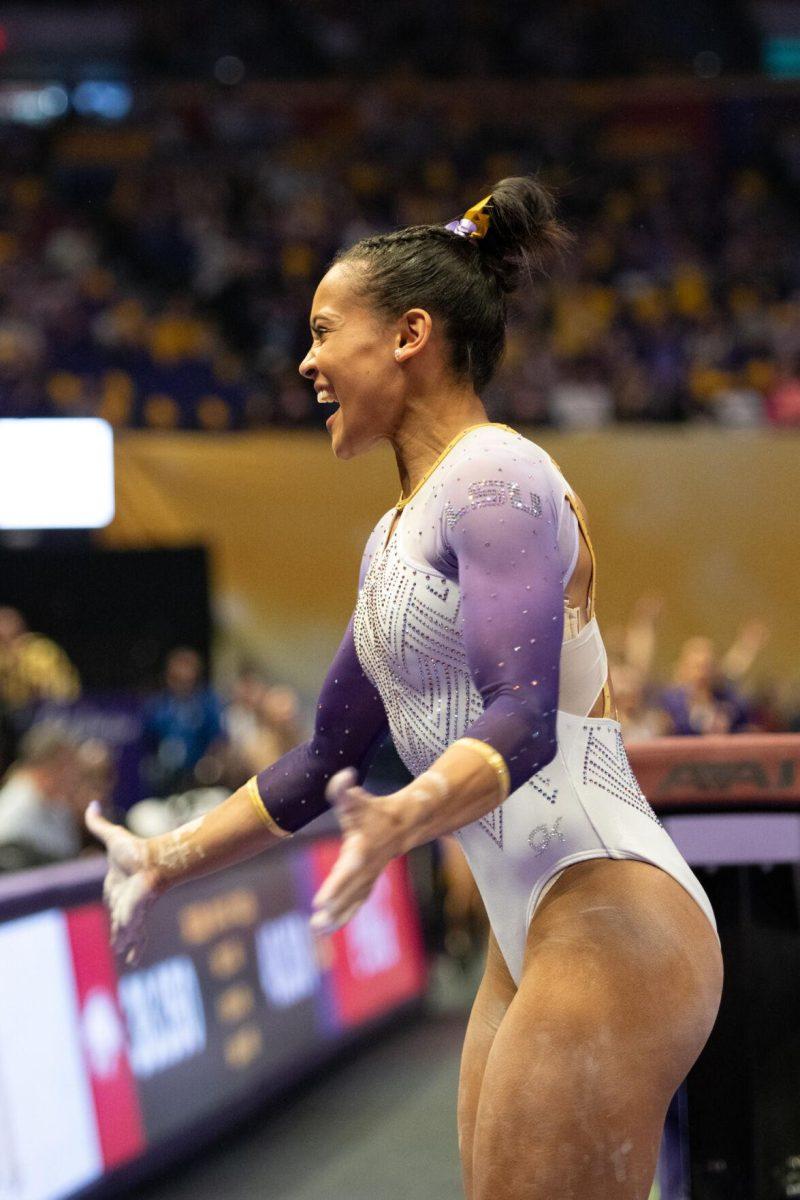 LSU gymnastics all-around senior Haleigh Bryant smiles after her vault Friday, Feb. 2, 2024, during LSU&#8217;s 198.475-196.200 win against Arkansas at the Pete Maravich Assembly Center in Baton Rouge, La.