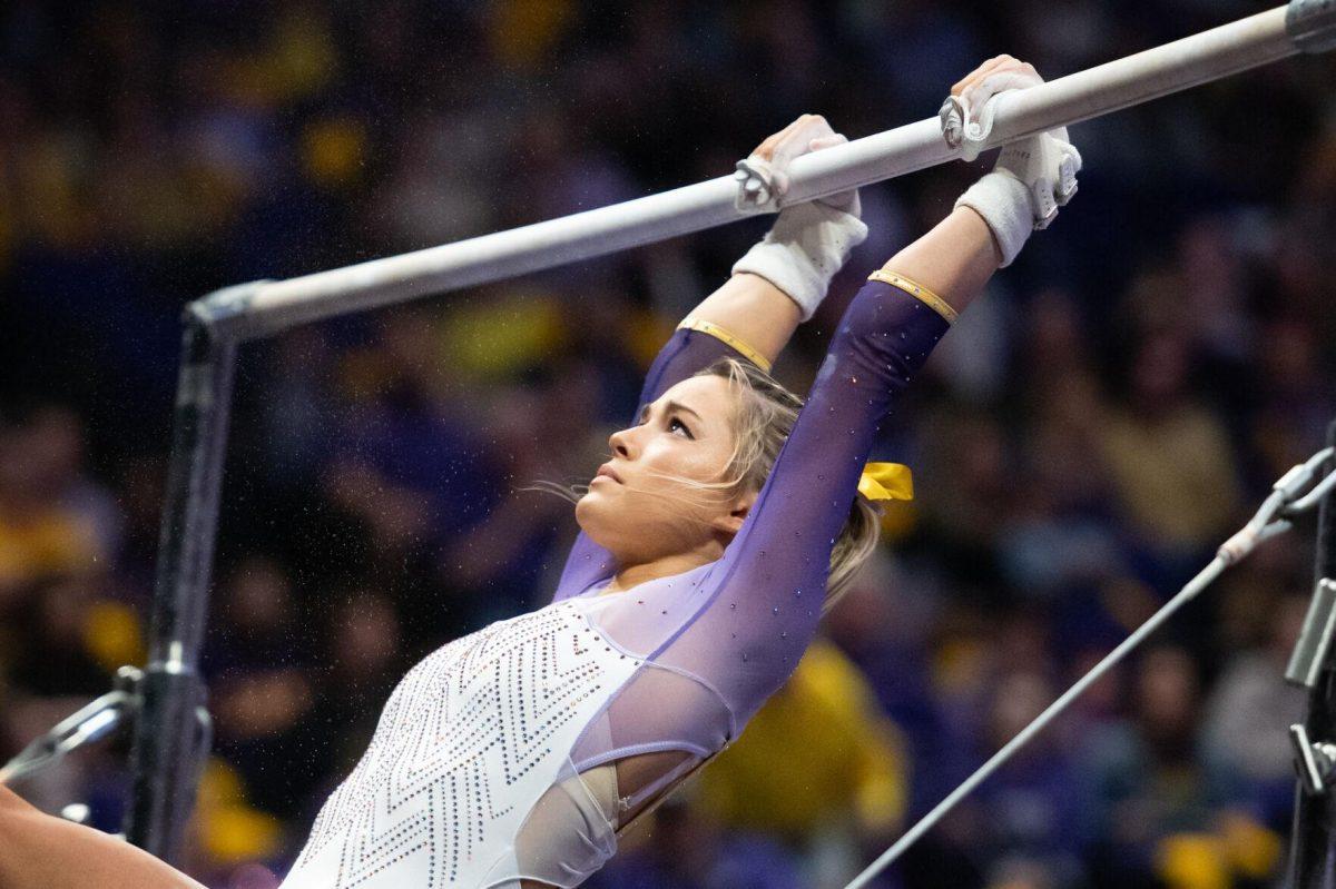 LSU gymnastics all-around senior Olivia Dunne performs an exhibition routine on the uneven bars&#160;Friday, Feb. 2, 2024, during LSU&#8217;s&#160;198.475-196.200 win&#160;against Arkansas at the Pete Maravich Assembly Center in Baton Rouge, La.