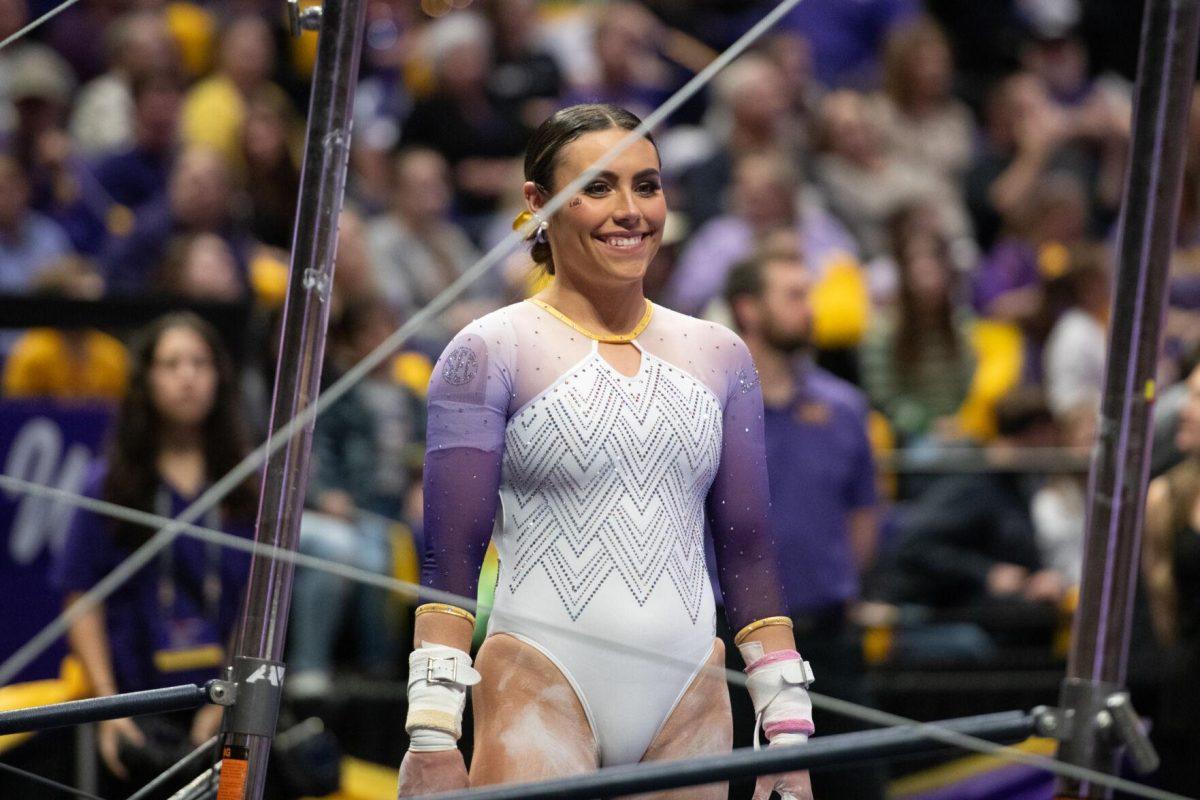 LSU gymnastics all-around junior Alexis Jeffrey smiles before her uneven bars routine Friday, Feb. 2, 2024, during LSU&#8217;s 198.475-196.200 win against Arkansas at the Pete Maravich Assembly Center in Baton Rouge, La.