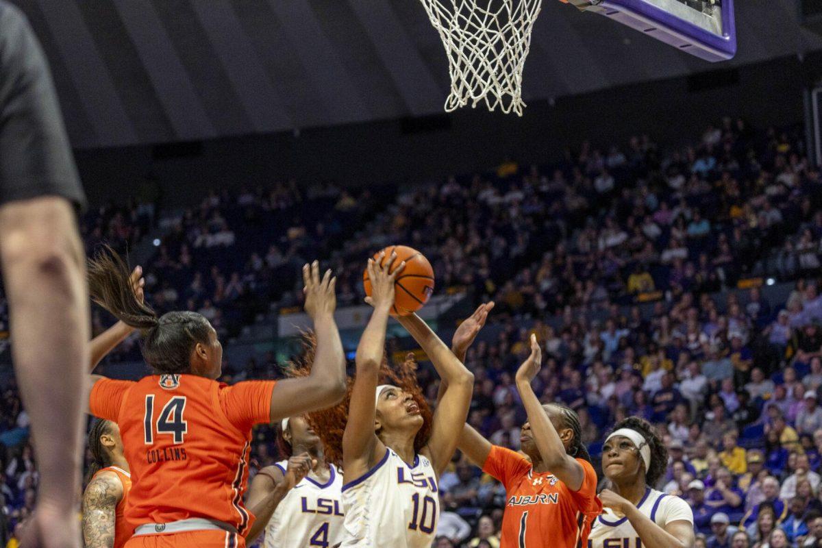 LSU women's basketball junior forward Angel Reese shoots the ball Thursday, Feb. 22, 2024, during LSU's 71-66 win over Auburn Pete Maravich Assembly Center in Baton Rouge, La.