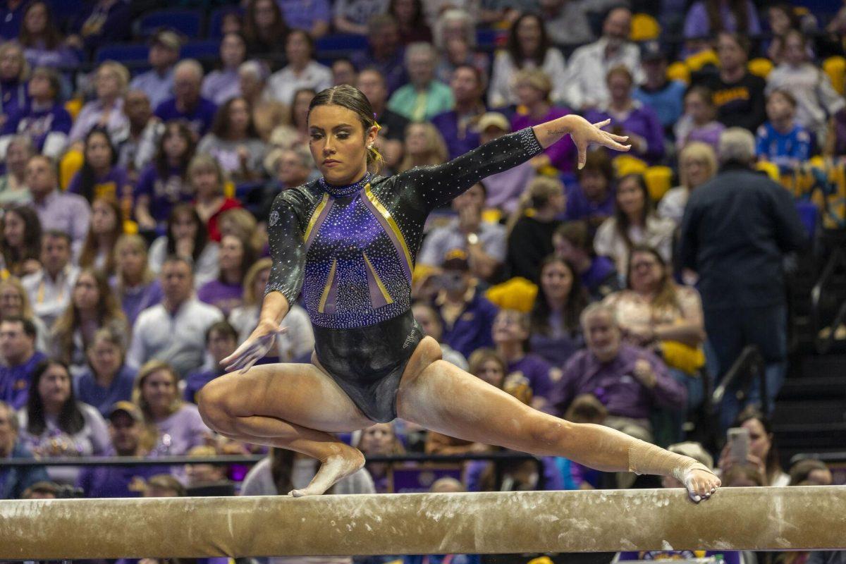 LSU gymnastics junior all-around Alexis Jeffrey poses on the balance beam Friday, Feb. 16, 2024, during LSU's win 198.300-197.10 against Auburn in the Pete Maravich Assembly Center.
