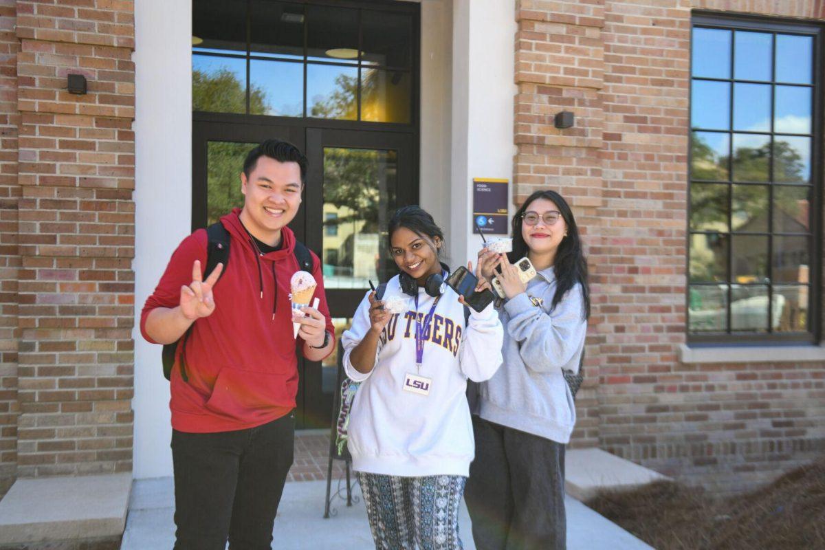 Students enjoy their ice cream while leaving the new Dairy Store location Tuesday, Feb. 20, 2024, on S. Campus Dr. on LSU&#8217;s campus in Baton Rouge, La.