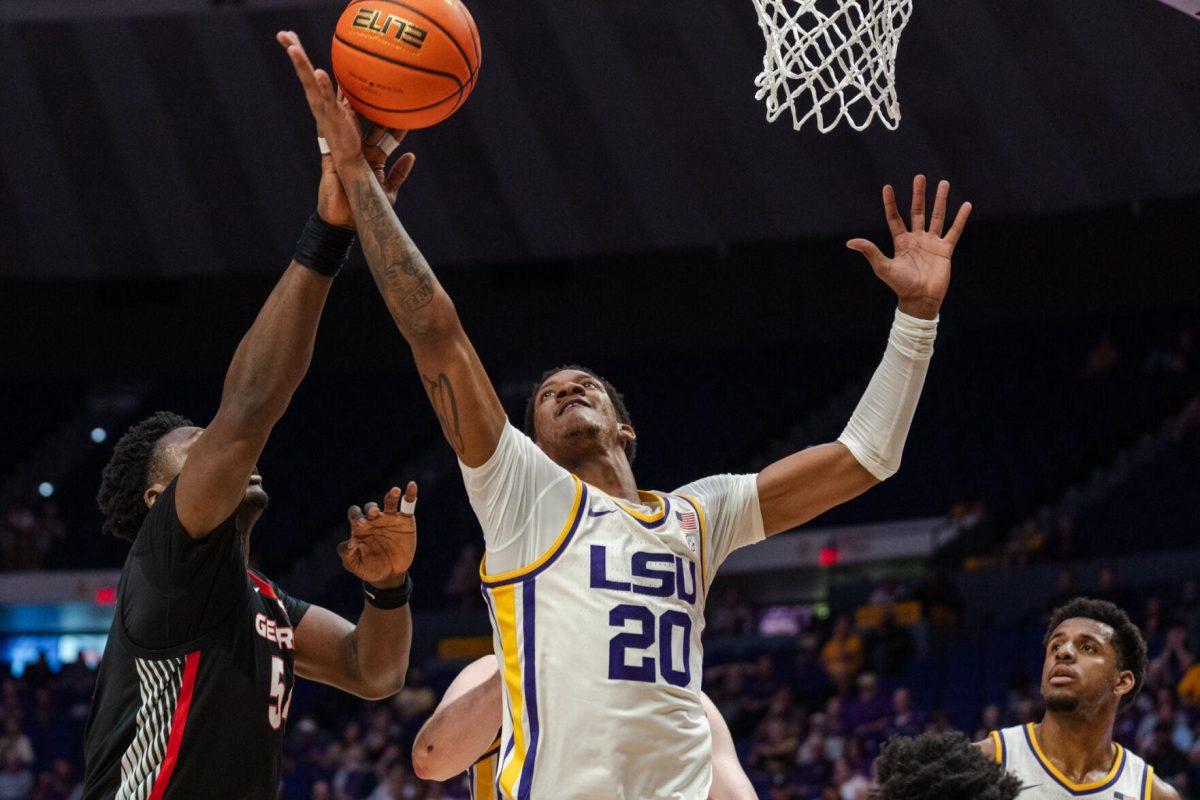 LSU men&#8217;s basketball senior forward Derek Fountain (20) goes for the rebound Tuesday, Feb. 27, 2024, during LSU&#8217;s 67-66 win against Georgia in the Pete Maravich Assembly Center in Baton Rouge, La.