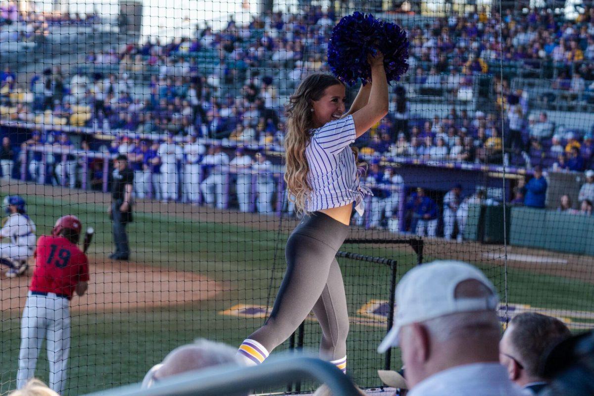 A Tiger Girl dances Friday, Feb. 23, 2024, during LSU&#8217;s 5-2 loss against Stony Brook at Alex Box Stadium in Baton Rouge, La.