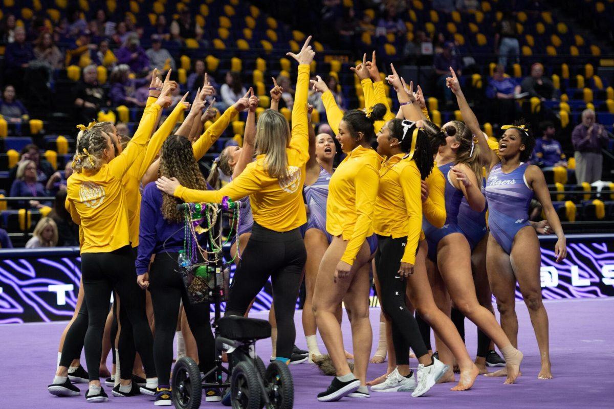 LSU gymnastics team huddles&#160;Friday, Feb. 2, 2024, before LSU&#8217;s&#160;198.475-196.200 win&#160;against Arkansas at the Pete Maravich Assembly Center in Baton Rouge, La.