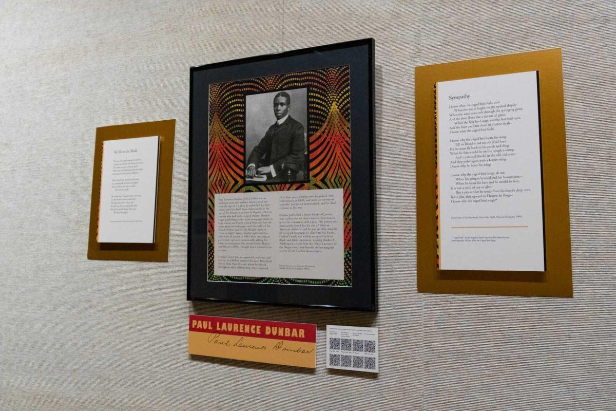 Poetry and biographical information about Paul Laurence Dunbar hangs on a wall Tuesday, Feb. 20, 2024, as part of the Wyatt Houston Day Collection of Poetry by African Americans exhibition at Hill Memorial Library in Baton Rouge, La.