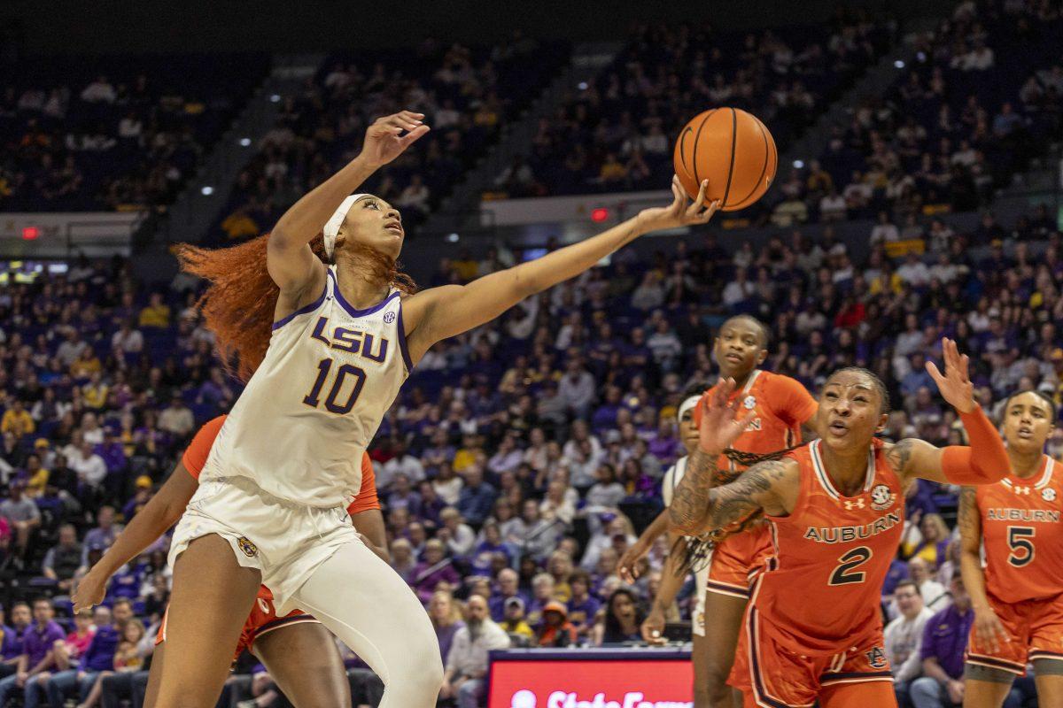 LSU women's basketball junior forward Angel Reese (10) makes a rebound Thursday, Feb. 22, 2024, during LSU's 71-66 win over Auburn Pete Maravich Assembly Center in Baton Rouge, La.