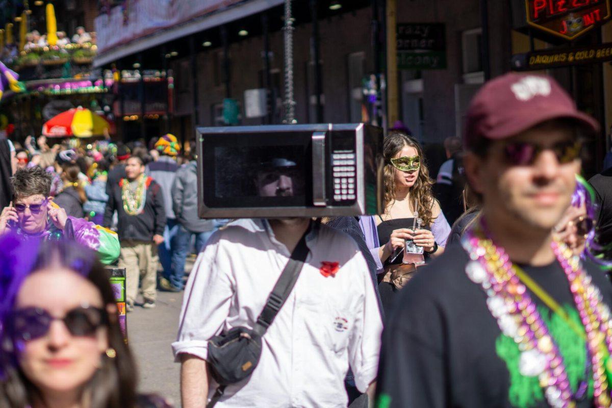 A microwave walks by Tuesday, Feb. 13, 2024, on Bourbon Street in New Orleans, La.