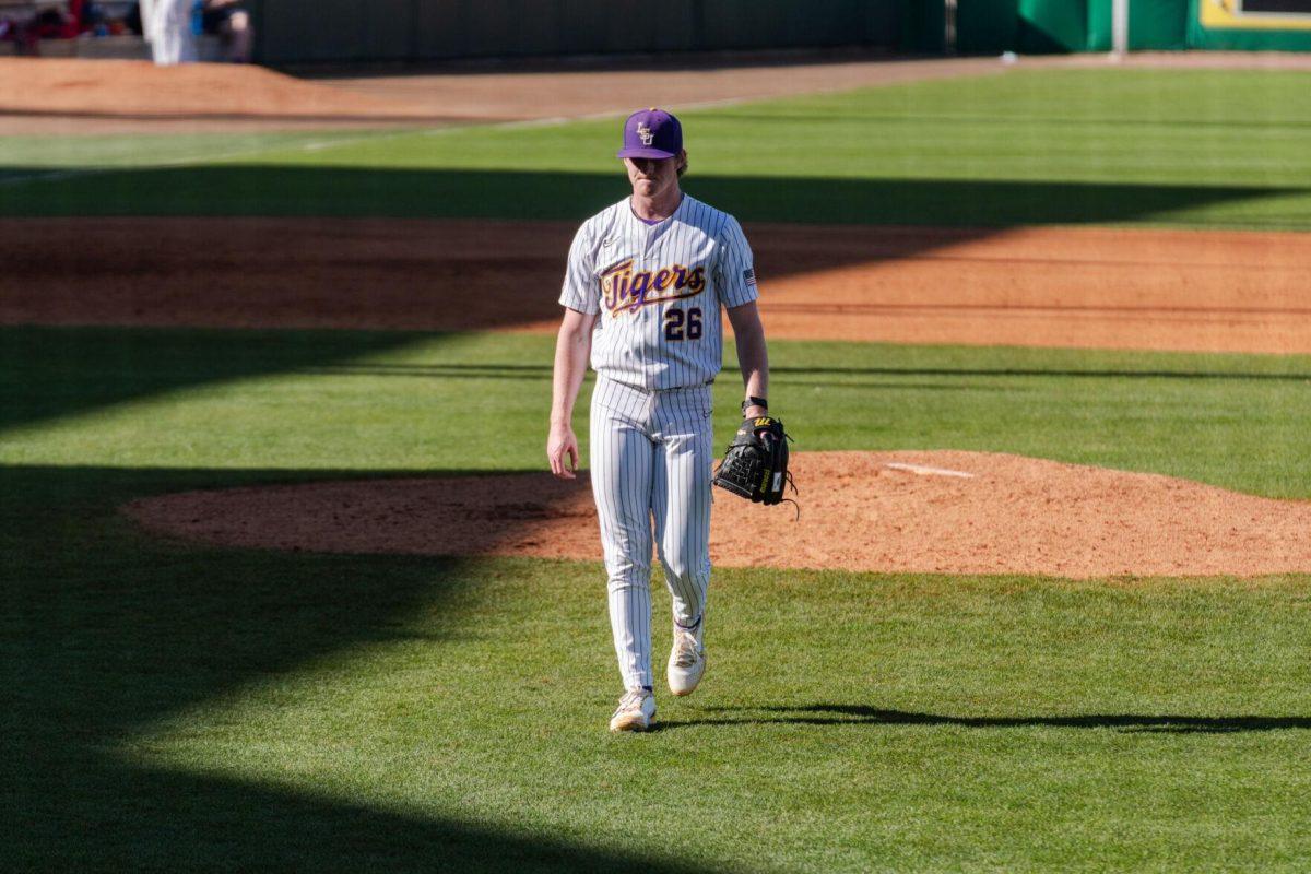 LSU baseball junior pitcher Thatcher Hurd (26) walks off the field Friday, Feb. 23, 2024, during LSU&#8217;s 5-2 loss against Stony Brook at Alex Box Stadium in Baton Rouge, La.