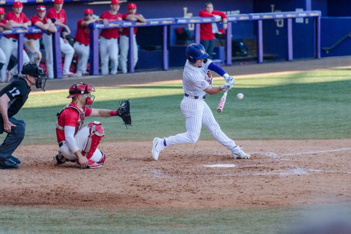 LSU baseball senior outfielder Mac Bingham (9) swings his bat Friday, Feb. 23, 2024, during LSU&#8217;s 5-2 loss against Stony Brook at Alex Box Stadium in Baton Rouge, La.