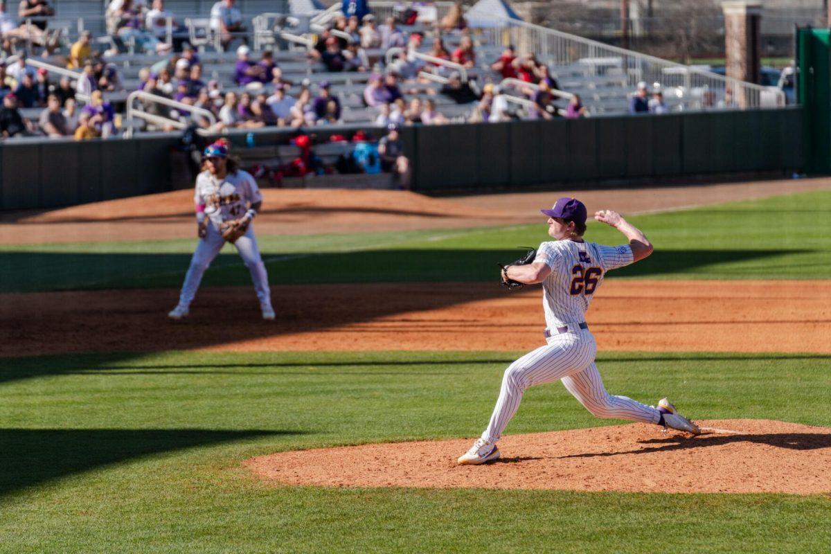 LSU baseball junior pitcher Thatcher Hurd (26) throws the ball Friday, Feb. 23, 2024, during LSU&#8217;s 5-2 loss against Stony Brook at Alex Box Stadium in Baton Rouge, La.