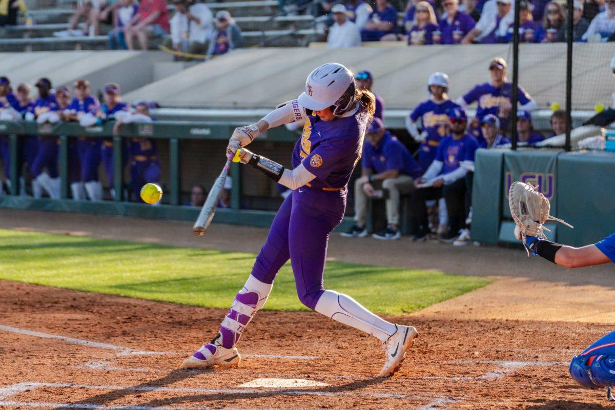 LSU softball graduate student infielder Taylor Pleasants (17) swings for the ball Friday, Feb. 23, 2024, during LSU&#8217;s 8-5 win over Boise State at Tiger Park in Baton Rouge, La.