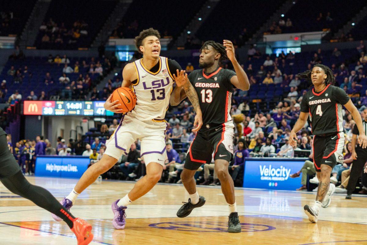 LSU men&#8217;s basketball sophomore forward Jalen Reed (13) drives toward the basket Tuesday, Feb. 27, 2024, during LSU&#8217;s 67-66 win against Georgia in the Pete Maravich Assembly Center in Baton Rouge, La.