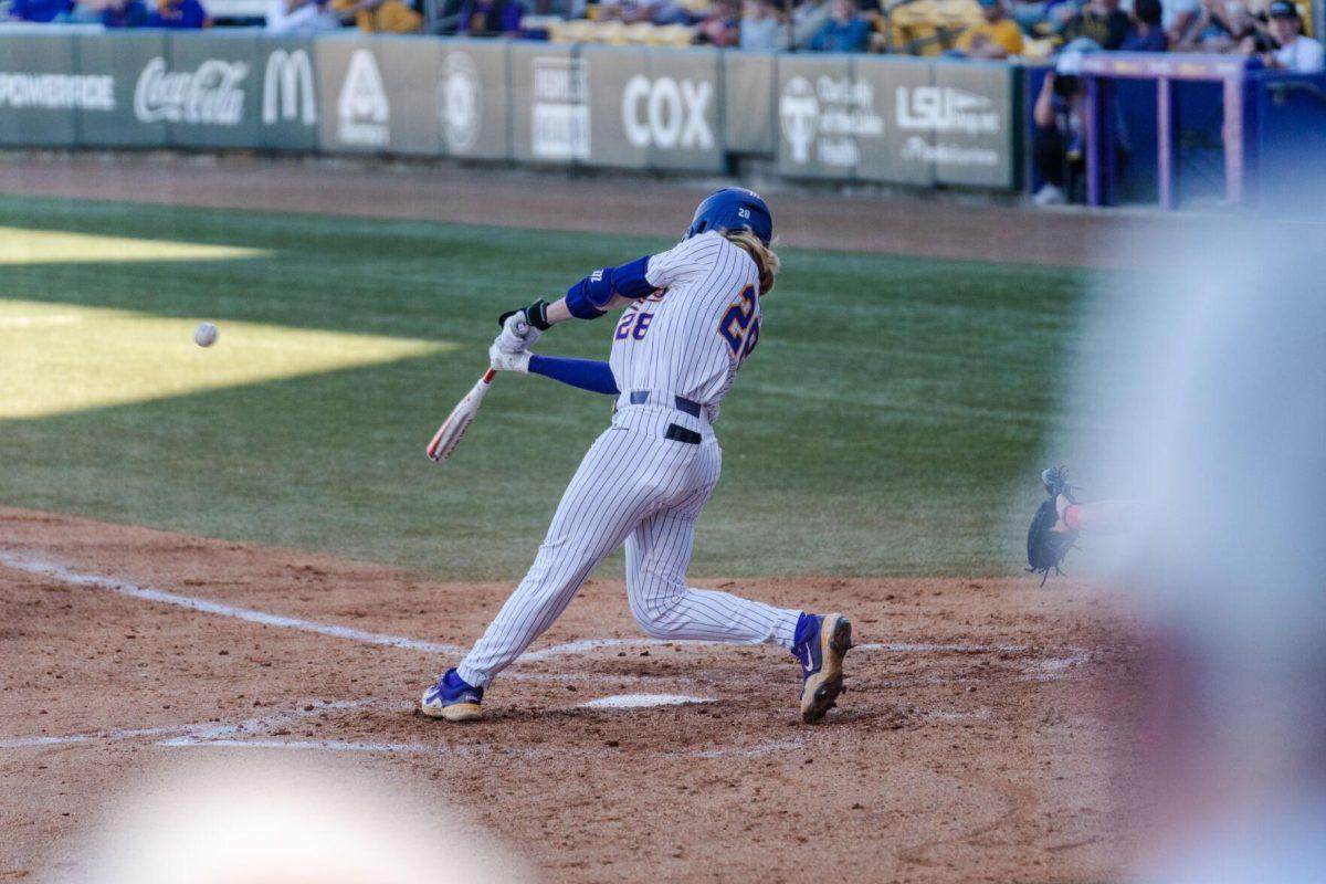 LSU baseball sophomore outfielder Paxton Kling (28) swings at the ball Friday, Feb. 23, 2024, during LSU&#8217;s 5-2 loss against Stony Brook at Alex Box Stadium in Baton Rouge, La.